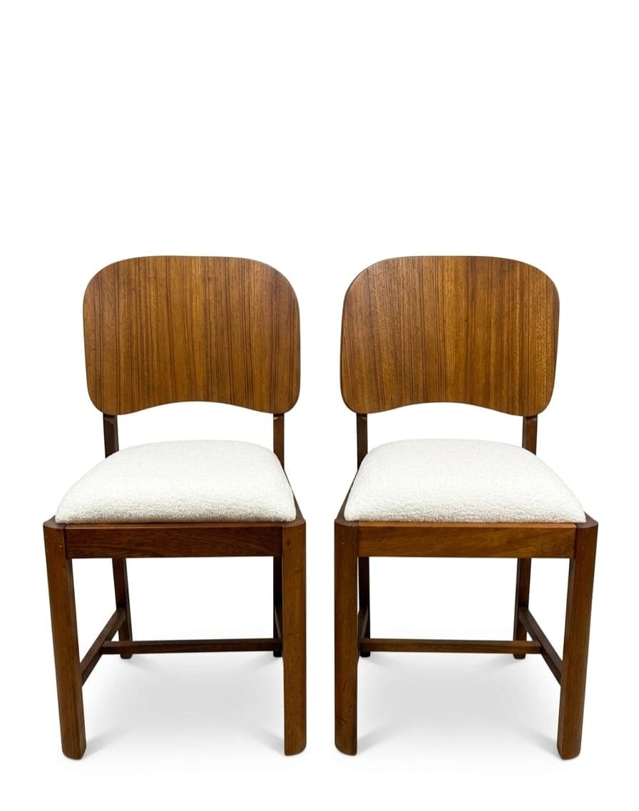 Front view of restored Duros dining chairs with off-white bouclé upholstery